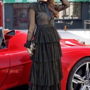 Black ruffles dress with gold dots